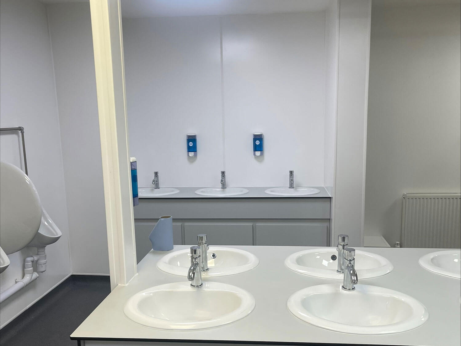 A close up image of newly installed sinks